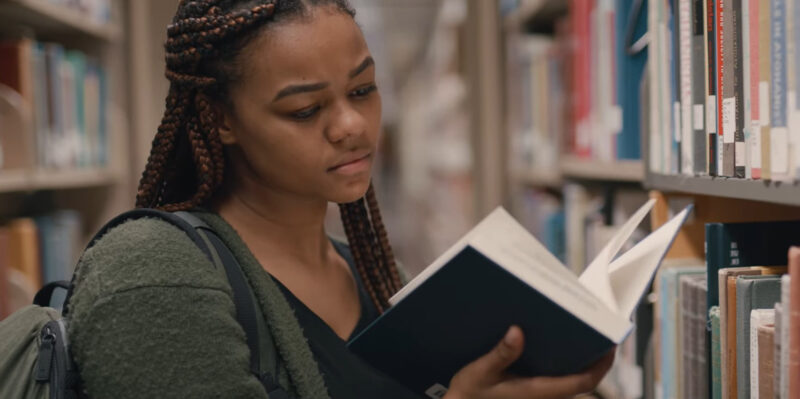 Student Choosing a Book